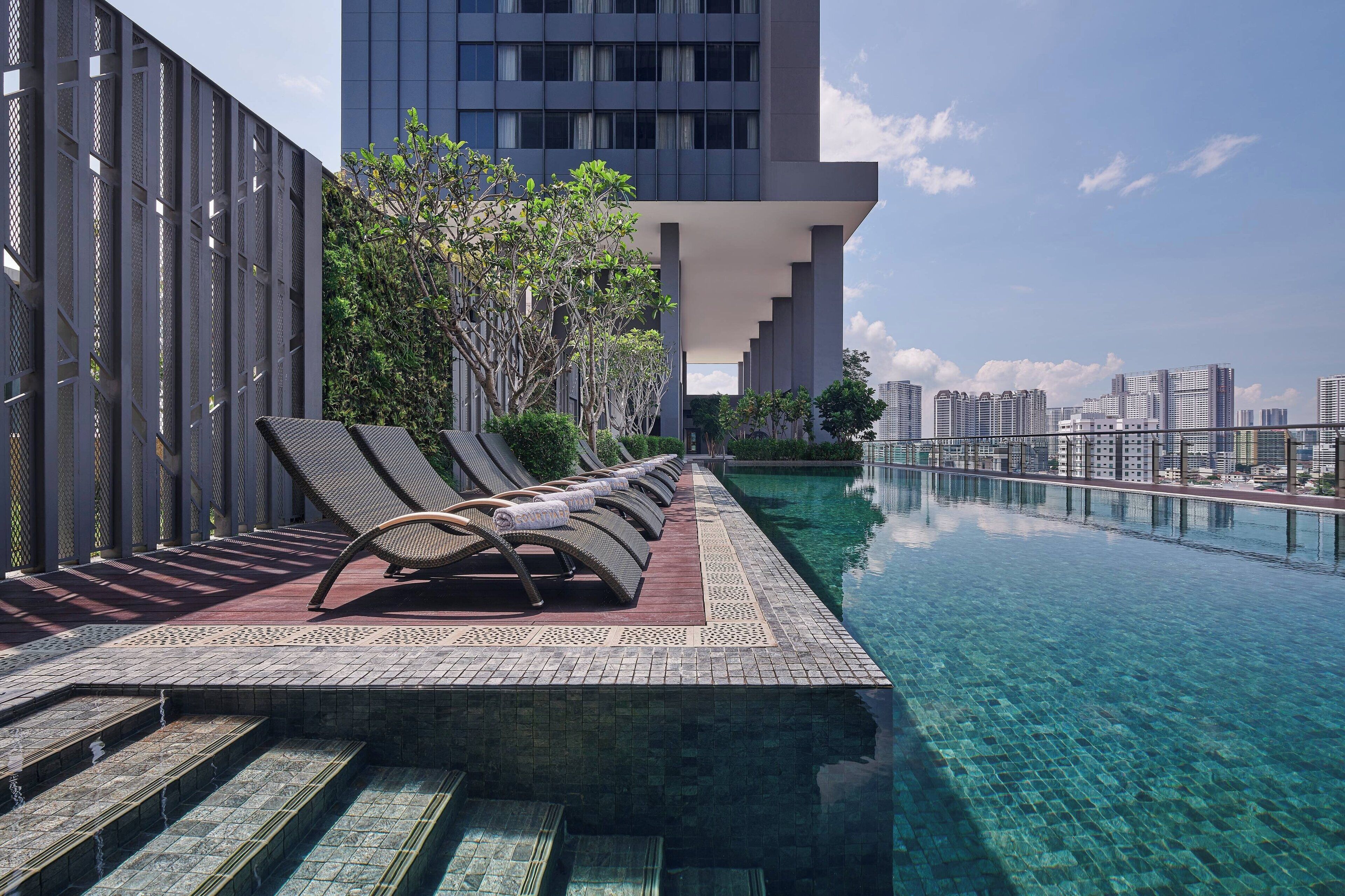 Outdoor pool, pool umbrellas, sun loungers