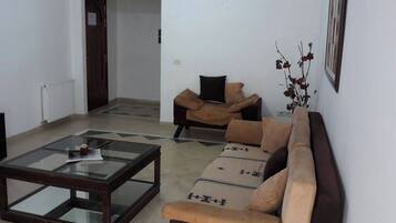 Apartment, 3 Bedrooms, Smoking, Balcony | Living area | TV
