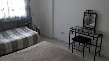 Apartment, 3 Bedrooms, Smoking, Balcony | 4 bedrooms, iron/ironing board