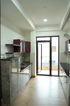 Apartemen, 3 kamar tidur, balkon, pemandangan gunung | Dapur pribadi | Ketel listrik