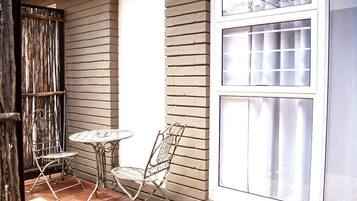 Quarto luxo, 1 quarto | Terraço/pátio