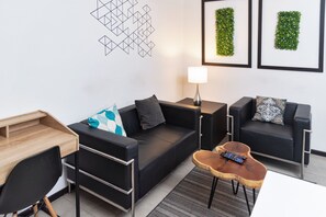Apartment, 2 Bedrooms | Living area | Flat-screen TV