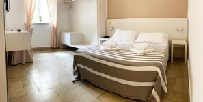 Basic Double Room, 1 Queen Bed, Non Smoking | Minibar, desk, free WiFi, bed sheets