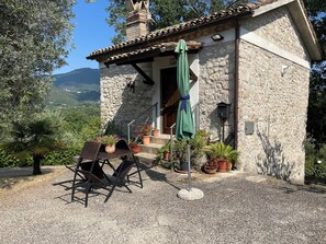 Outdoor dining - Stone farmhouse amidst greenery, secolar olive trees and privacy that reigns supreme  (Vacone)