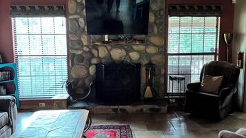 Smart TV, fireplace, DVD player, video library