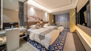 A modern hotel room with two beds, a large mirror, a bathroom with a sink, and a TV. - Shangyuan Chain Hotel Guangzhou Railway Station (Guangzhou)