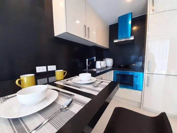 Private kitchen - Grand Avenue Pattaya By Stayparadise9 (Pattaya)