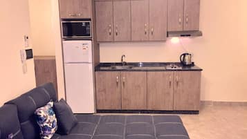 Apartment, 1 Bedroom, Accessible, Smoking | Private kitchen | Fridge, microwave, stovetop, coffee/tea maker