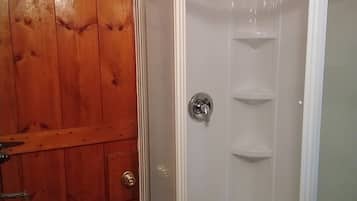 Shower, towels, soap, toilet paper