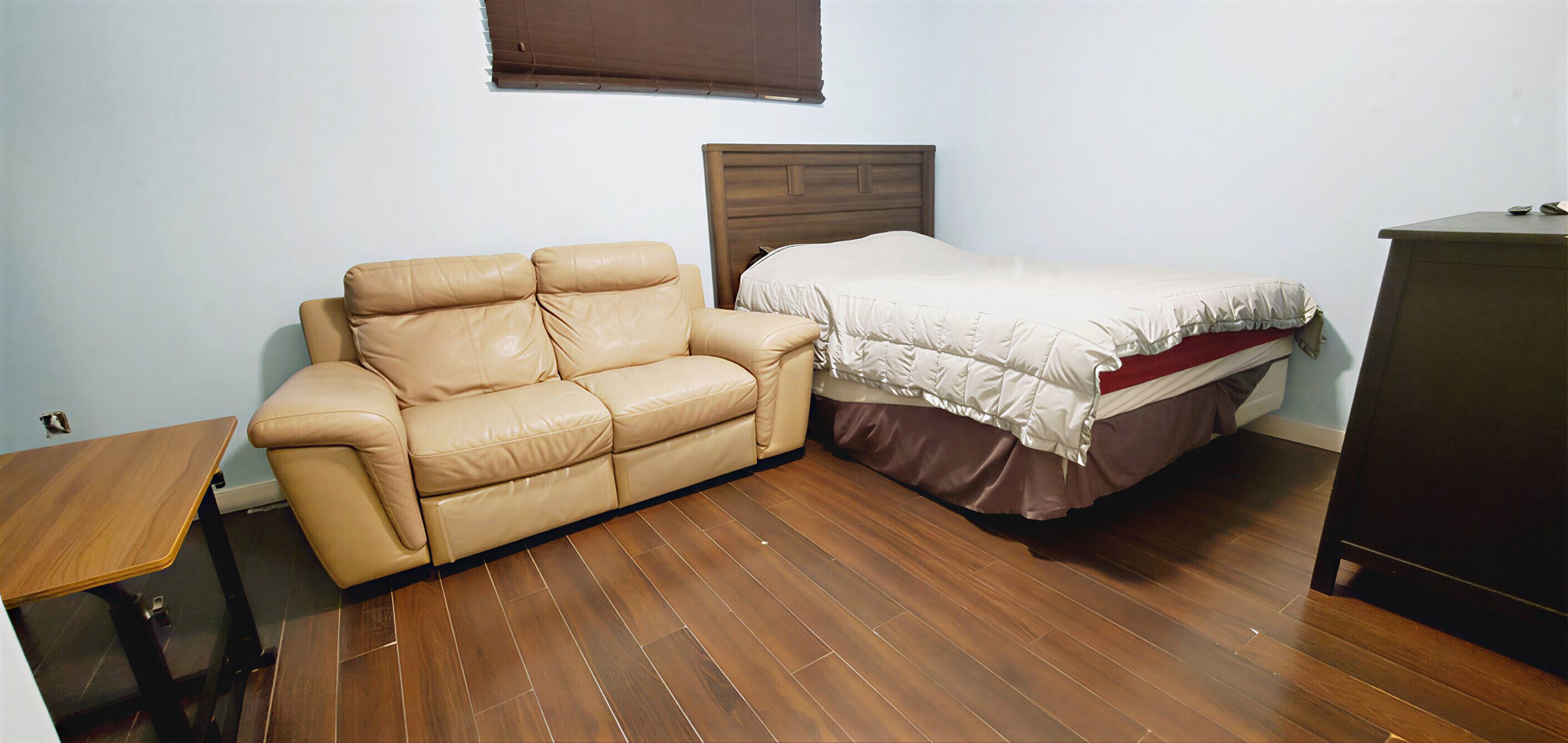 Cozy living area with dedicated storage—ideal for professional stays.