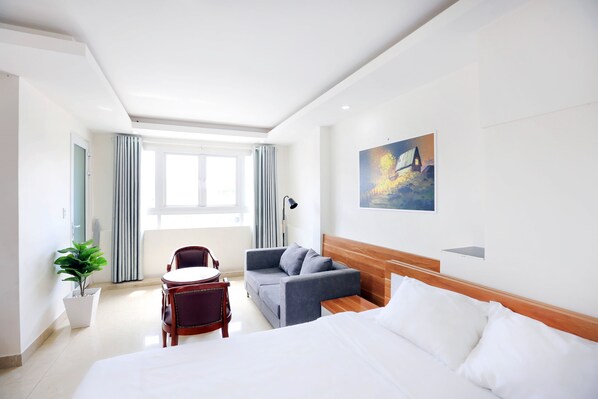 Habitación doble Deluxe | Minibar, escritorio, cortinas blackout y insonorización 