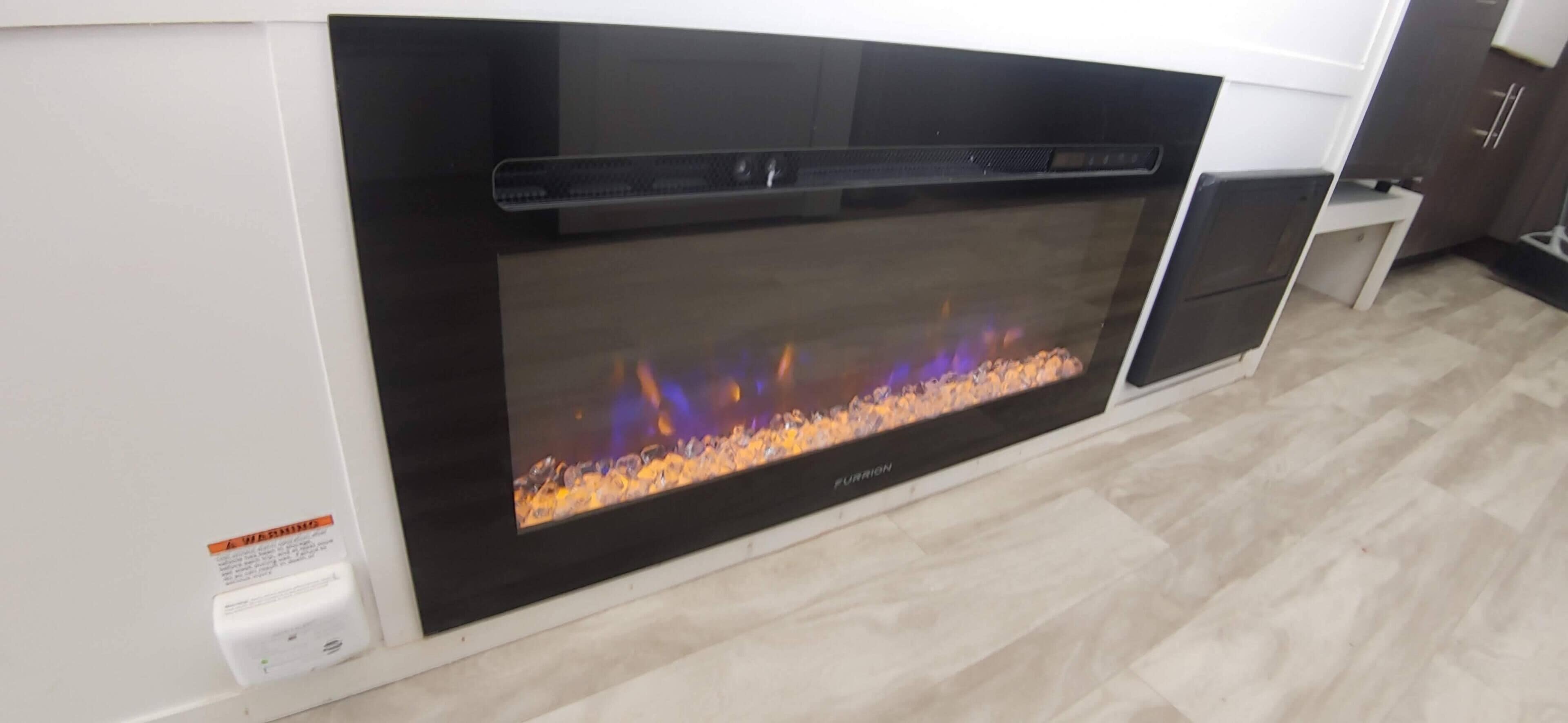 A modern kitchen with a built-in stove and oven.