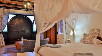 Tabla de planchar con plancha, wifi gratis y ropa de cama 