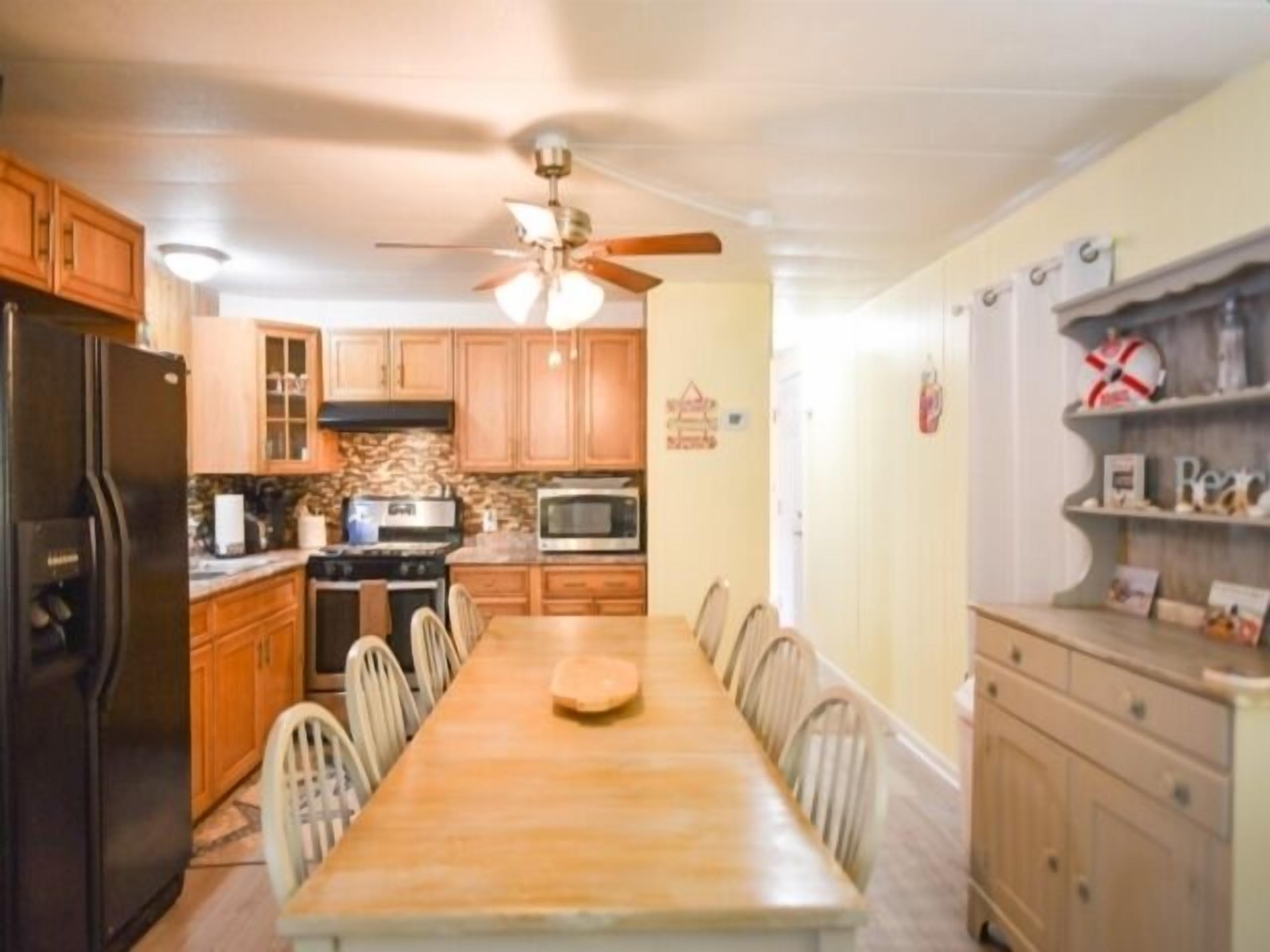 Fridge, microwave, stovetop, cookware/dishes/utensils