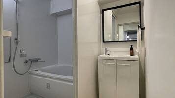 Comfort Condo, 1 Bedroom (704) | Bathroom | Combined shower/tub, deep soaking tub, free toiletries, hair dryer