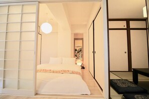 Condo, 2 Bedrooms (503) | Individually decorated, desk, laptop workspace, iron/ironing board - Dai3Himawari Building 503 (Hiroshima)
