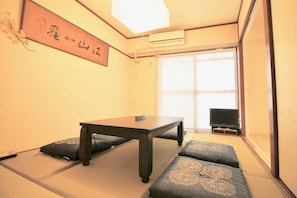 Individually decorated, desk, laptop workspace, iron/ironing board