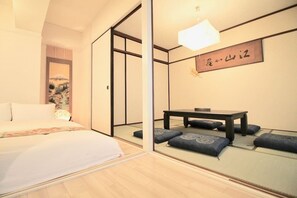 Condo, 2 Bedrooms (503) | Individually decorated, desk, laptop workspace, iron/ironing board - Dai3Himawari Building 503 (Hiroshima)
