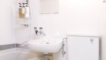 Condo, 1 Bedroom (302) | Bathroom | Combined shower/tub, deep soaking tub, free toiletries, hair dryer