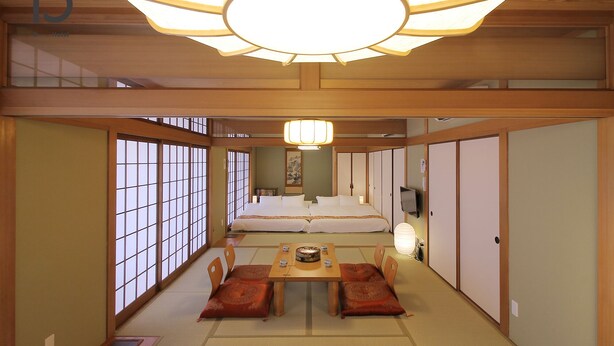 A traditional Japanese-style room with tatami flooring, a low table with cushions, and sliding doors. - Hanagin Building (Hiroshima)