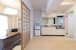 Condo, 2 Bedrooms (301) | Individually decorated, individually furnished, desk, laptop workspace - Mitsuyama Building (Hiroshima)