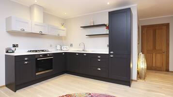 Apartment | Private kitchen | Fridge, microwave, coffee/tea maker, electric kettle