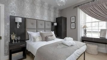 Departamento | 1 habitación, tabla de planchar con plancha, wifi gratis y ropa de cama