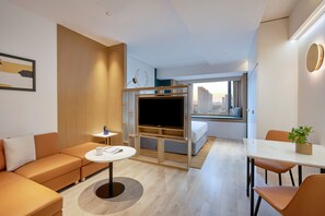 Studio, 1 King Bed | Living area | Flat-screen TV - Shama Hub New City Changchun (Changchun)