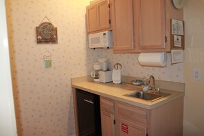 Fridge, microwave, coffee/tea maker, toaster