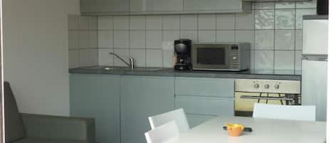 Fridge, microwave, cookware/dishes/utensils