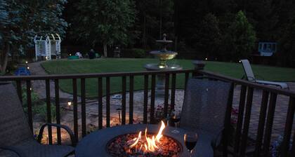 Spacious suite with fenced back yard, deck, gas grill, fireplaces and splash pad