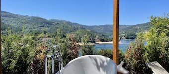 Lakeside cottage with fireplace, views and terraced gardens