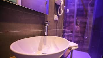 Shower, bidet, towels, soap