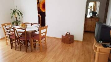 Comfort Apartment | Living area | Flat-screen TV