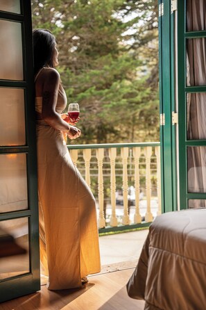 Habitación Deluxe, balcón | Ropa de cama 