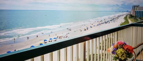On the beach, sun-loungers, beach towels