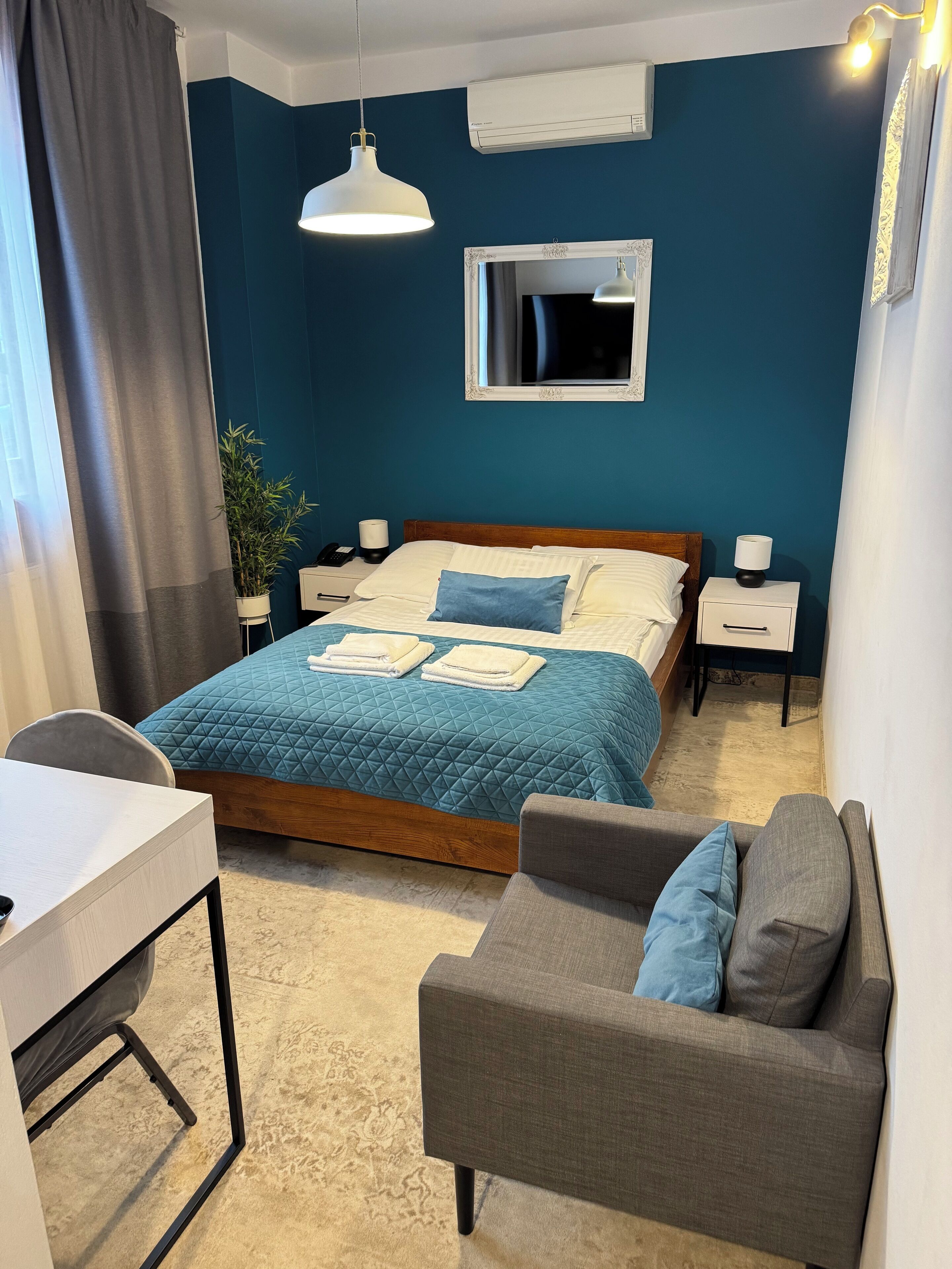 Premium bedding, down comforters, pillowtop beds, desk