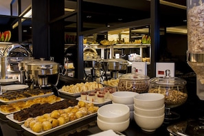 Indulge in a diverse selection of pastries, desserts, and fresh fruits at our buffet.