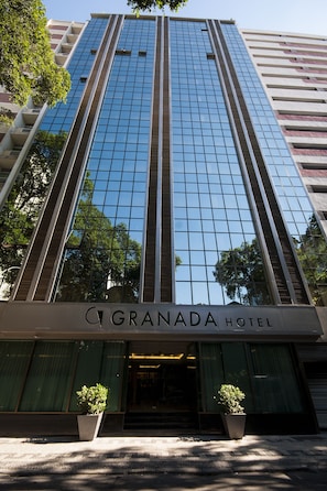 Reflecting the surroundings, the hotel's glass facade welcomes guests to The Granada.