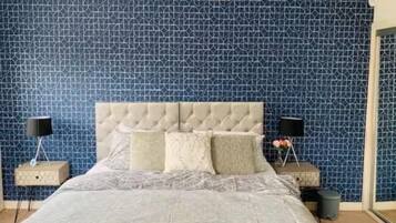 4 bedrooms, desk, iron/ironing board, travel cot