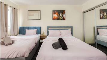 4 bedrooms, desk, iron/ironing board, travel cot