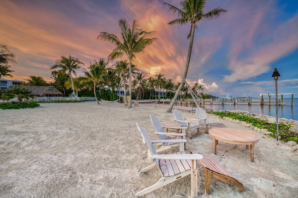 On the beach, sun loungers, beach umbrellas, beach towels