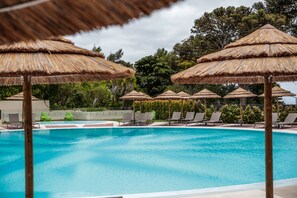 Outdoor pool, pool umbrellas, sun loungers