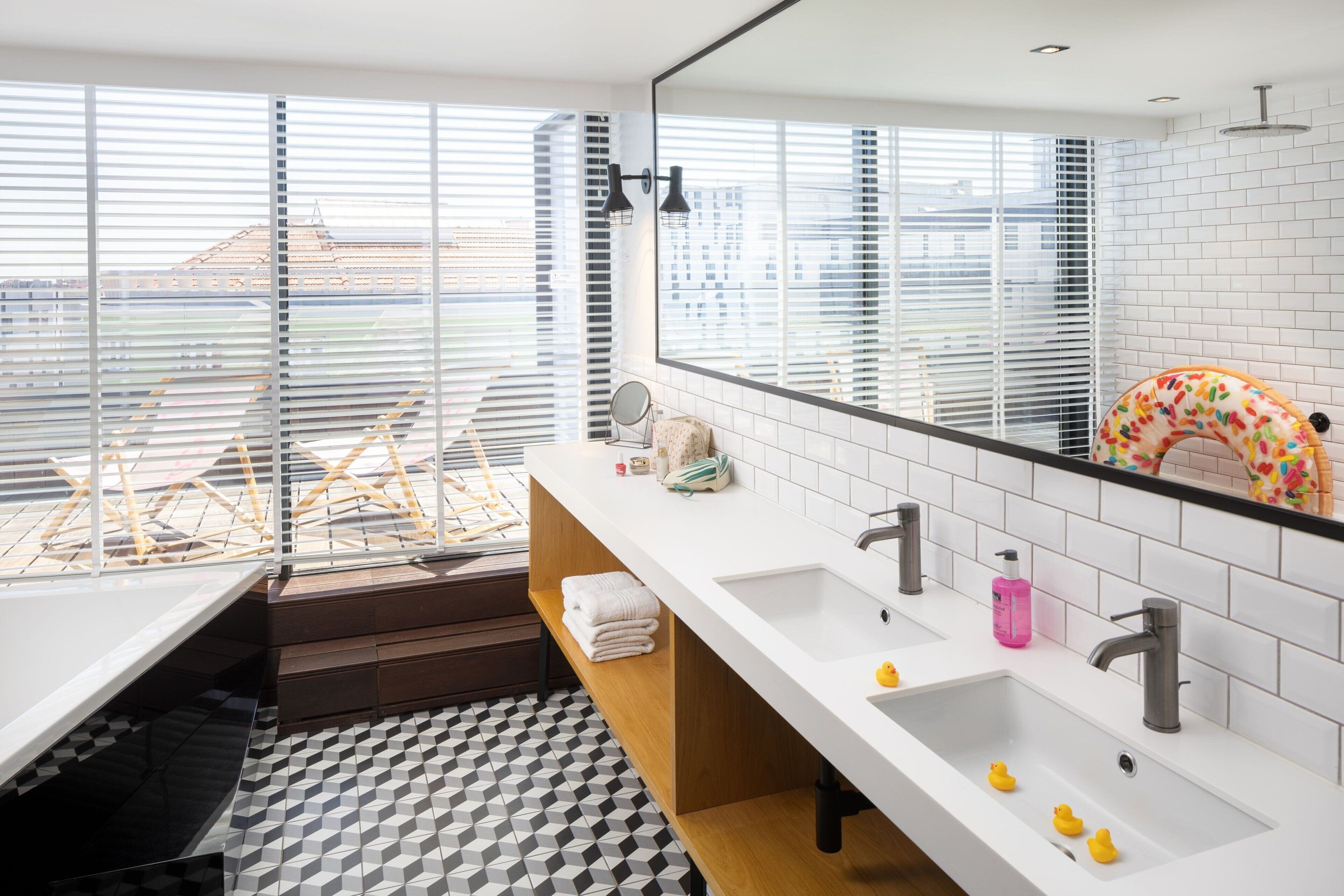 room, 1 queen bed with sofa bed | bathroom | eco-friendly toiletries, hair dryer, towels, soap