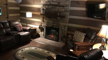 Smart TV, fireplace, books