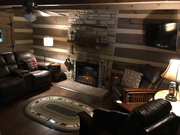 Smart TV, fireplace, books