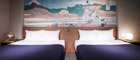 A hotel room with two beds, a traditional Japanese painting on the wall, and a nightstand with a lamp.