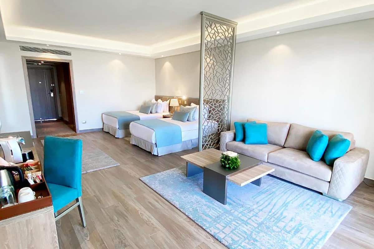 Suíte, 2 camas de solteiro, vista para o jardim | 1 quarto, frigobar (abastecido com itens grátis), cofres nos quartos