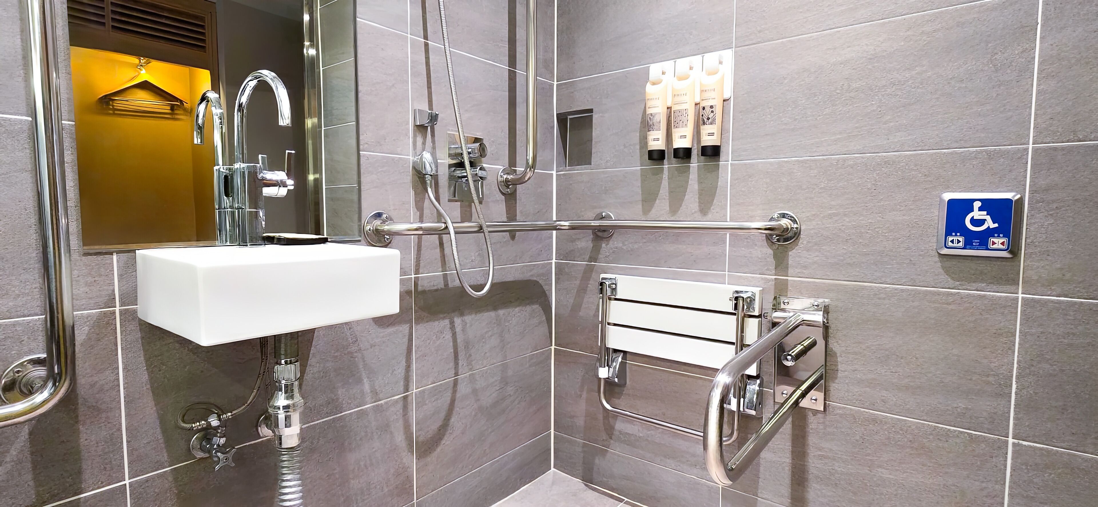 standard accessible (double/twin room subject to availability) | bathroom | hair dryer, slippers, bidet, towels