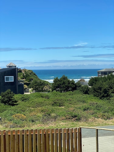 Ocean view, 100 yards to beach, pet friendly, secure fenced yard.